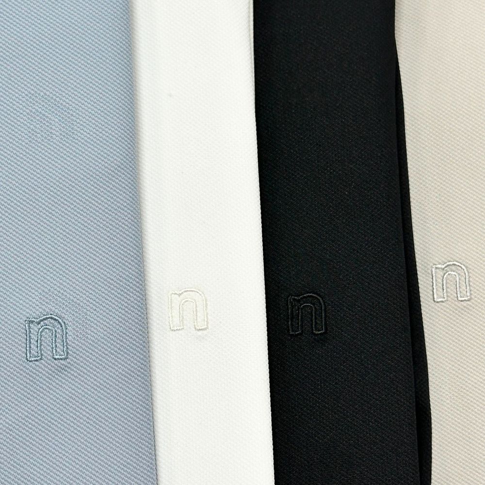 ÁO POLO NAM NOVELTY REGULAR FIT COOL FEELING TRƠN MÀU ĐEN NATMMDMNER260890N